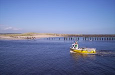 Little Boat moves into Amble harbour.JPG