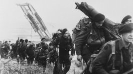 Royal Marine commandos moving off the Normandy Beaches on D-Day 06061944 CREDIT PA .jpg
